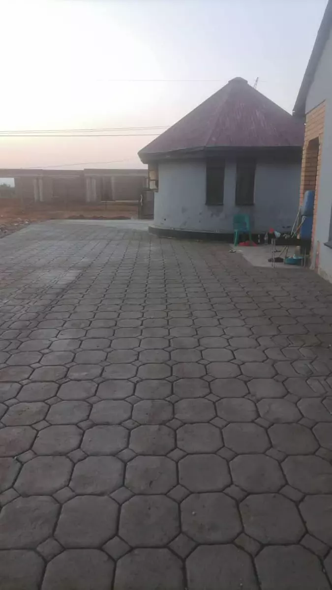Paved courtyard and round building